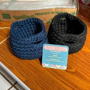 2- simple small baskets made with thick cords.  3x4